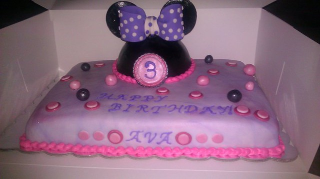 A baby coverlet cake simply piping colored squares block cake Minnie Mouse 