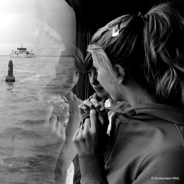 Dreamy girls' reflections at sea