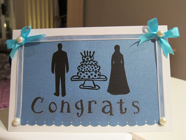 wedding card sample one used a laser to cut out male female shadows