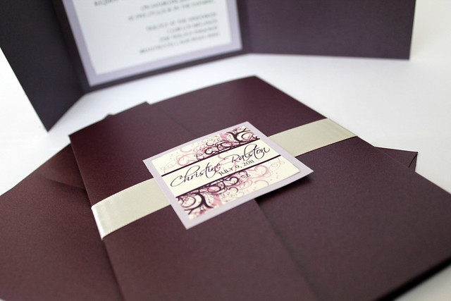 Eggplant and Wisteria colored wedding invitations printed on ivory linen 