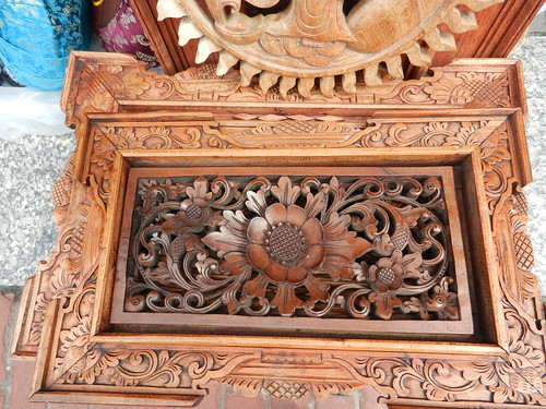 Ornately carved wooden panel, flower ornament, under the tent, Kalachakra for World Peace, Washington D.C., USA by Wonderlane