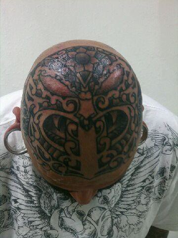 poly tribal head tattoo