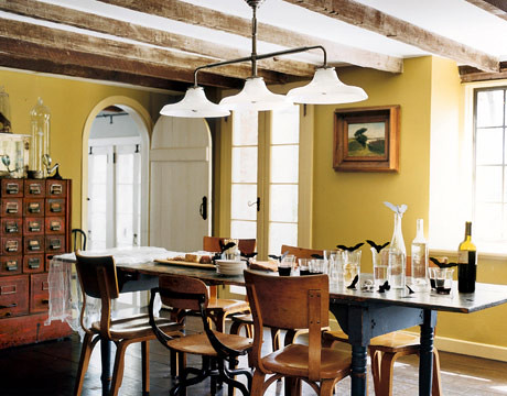Yellow dining room: Vintage card catalog + exposed beams + Thonet chairs by xJavierx