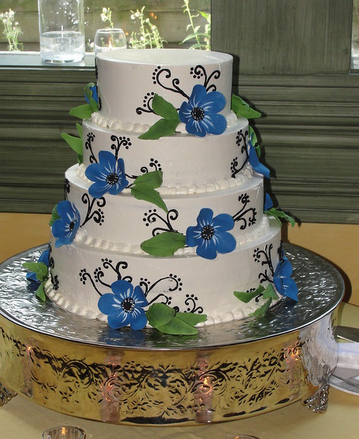 Black white and blue wedding cake Alternating layers of carrot cake with