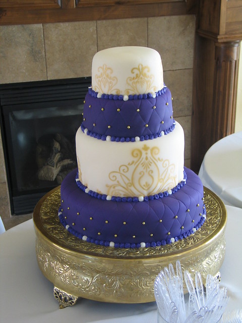 4 tier Purple and Gold Wedding Cake