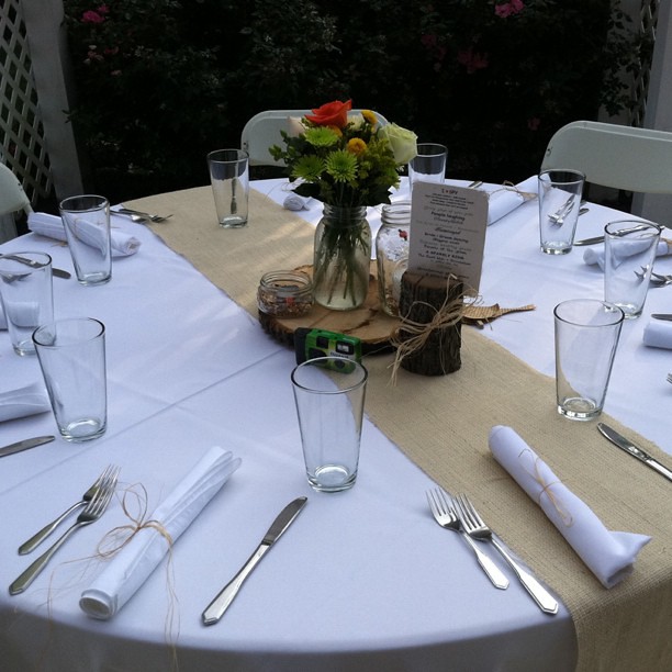 Wedding table setting with burlap birdseed and wood DIY wedding