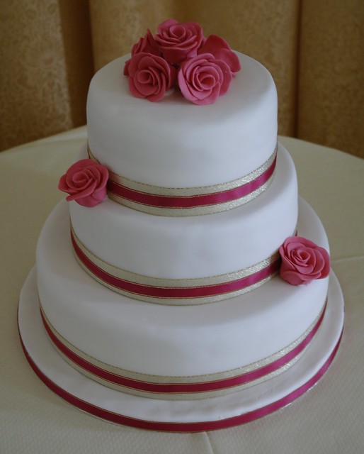 Ivory Pink and Gold Wedding Cake A simple and classic design