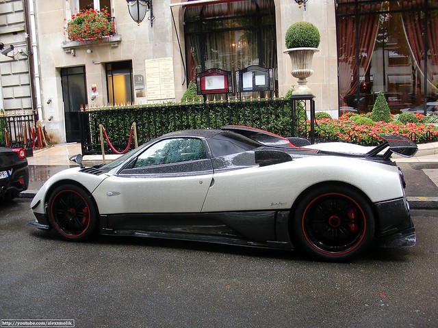 Under the rain in Paris parked behind a black Ferrari 458 italia