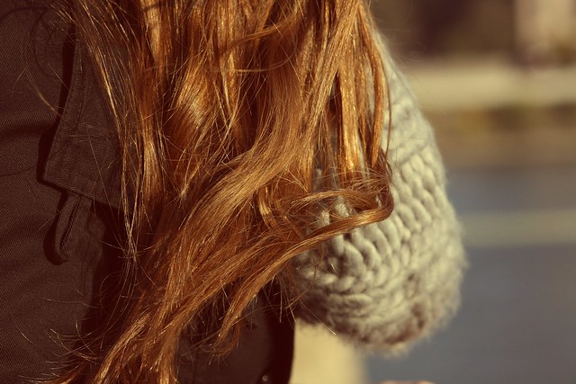 scarf and brown hair.