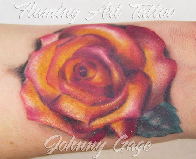Pink rose tattoo