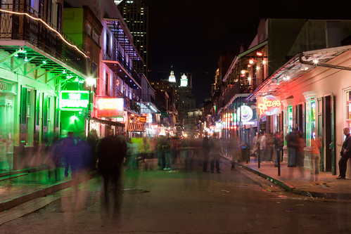 Bourbon Street in New Orleans at night, shadow figure walking. Bourbon Street, New Orleans, Louisiana