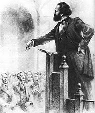 A depiction of Karl Marx addressing the founding meeting of the International Working Men's Association, First International, in London during 1864. Marx wrote extensively on the impact of the capitalist system on workers and farmers. by Pan-African News Wire File Photos