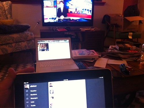 Watching tv, listening to musac from NYS's live stream on the laptop, while scanning twitter on the iPad. So po-mo.