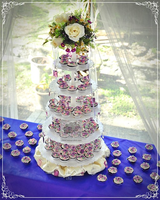 wedding cupcake tower purple totcupcakescom wwwtotcupcakescom