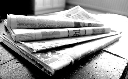 Newspapers on doorstep