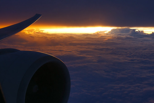 Sunrise over China on board KLM0803 bound to Manila by Curufinwe - David B.
