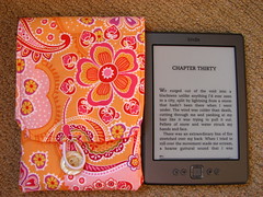 kindle next to cover