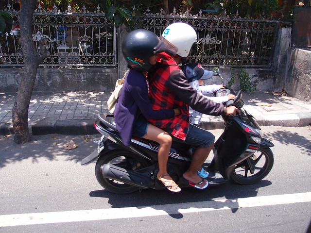 People travelling on Scooters & Motorbikes - Bali Indonesia