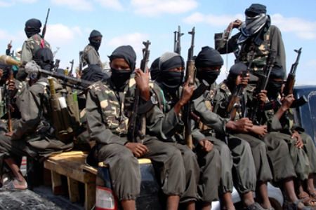 A column of Al-Shabaab fighters in Somalia. The organization reported that it ambushed and killed 30 Kenyan troops involved in a US-backed invasion of the Horn of Africa state. by Pan-African News Wire File Photos