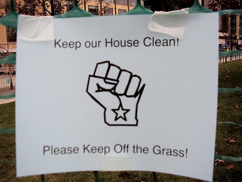 Sign on the green fence at the Capitol