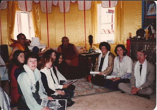 Dagchen Rinpoche's Seattle retinue (Liz, Eugenia, Danny, Adrienne, Kathy, Maliki, Blaine) at an audience with Dilgo Khyentse Rinpoche. HH Dilgo Khyentse was giving Dagchen Sakya a Long Life Wang, Naropa, Boulder, Colorado, USA, 1976 by Wonderlane