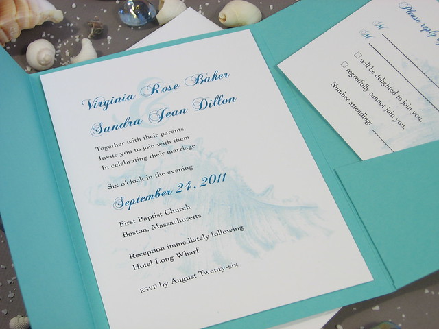 Teal Beach Wedding Invitation A single shell image is the backdrop for this
