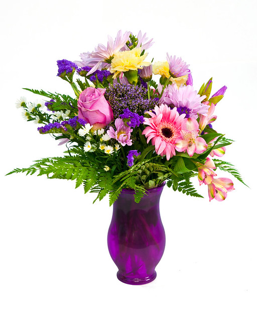 This is a beautiful purple wedding centerpiece of wholesale wedding flowers