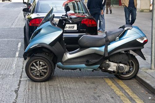 The Piaggio MP3 is a tilting three-wheeled scooter - scooters