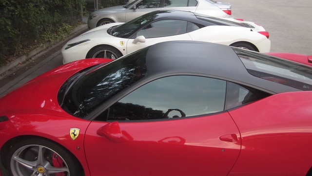 2 Ferrari 458 at the shanghai race track with different roof options 