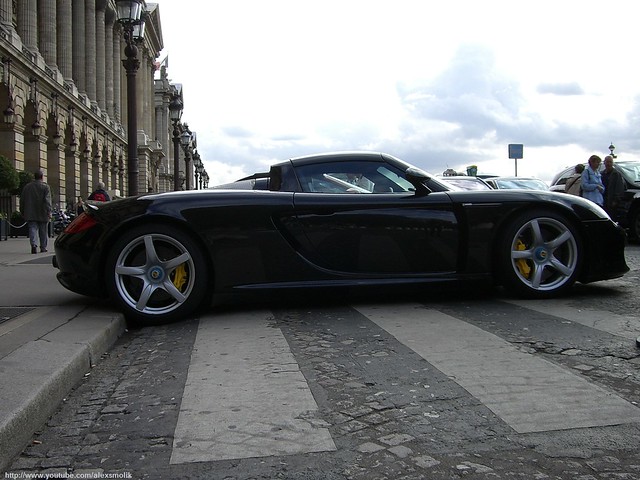 Black Porsche Carrera GT in Paris In front of Hotel Crillon