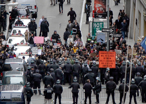 New York cops barricade streets to prevent demonstrators from reaching Wall Street on November 17, 2011. The city shutdown Zuccotti Park on November 15 to halt the anti-capitalist encampment. by Pan-African News Wire File Photos