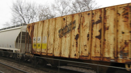 A former Chicago & NorthWestern Railroad covered hopper car in transit.  Riverside Illinois USA.  Sunday, November 20th, 2011. by Eddie from Chicago