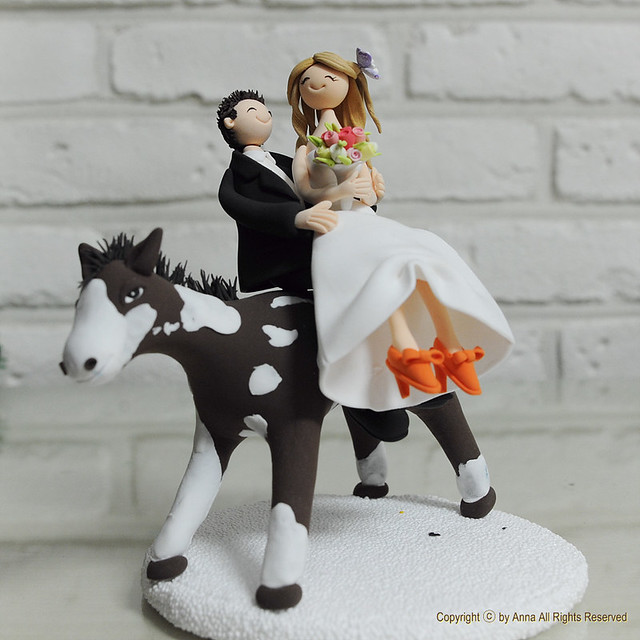 Horse riding theme wedding cake topper