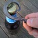 How to use a hand-forged bottle opener