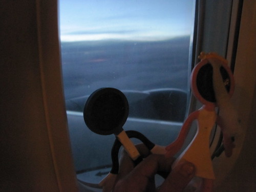 Our cake toppers looking out the window on the way home