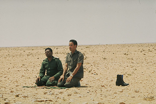 Col. Muammar Gaddafi and Major-General Abu-Bakr Yunis Jaber during the early days of the Al-Fateh Revolution in Libya. The gains of the Green Revolution are being systematically dismantled by the US-NATO occupation and its puppets. by Pan-African News Wire File Photos