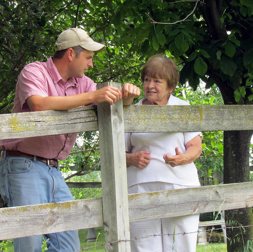 Harrisonburg District Conservationist Cory Guilliams chats with Janet Kline on a site visit to her farm. 