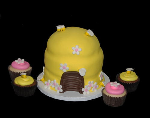pink and yellow bumble bee themed cupcake tower topper cake