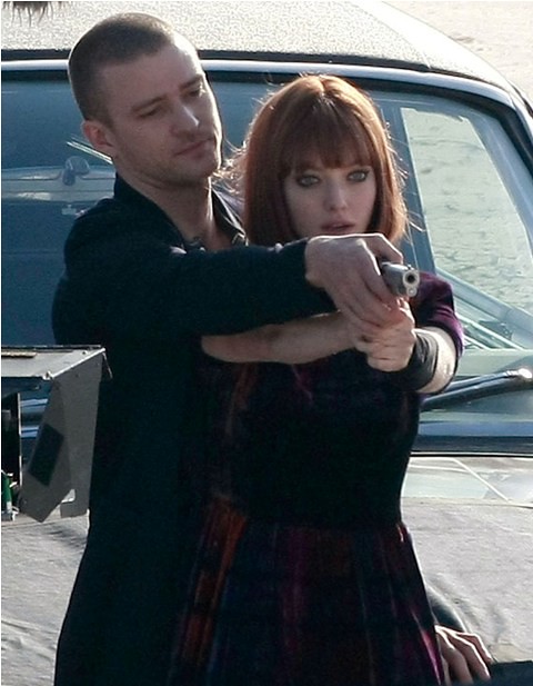 Justin Timberlake And Amanda Seyfried Shooting A Gun On The Set Of'Now'