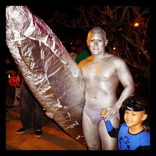Best costume of the night: The Silver Surfer. And son. And giant hoagie. by chotda