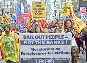 April 3, 2009 demonstration on Wall Street calling for a complete bailout of the people, not the banks. The demonstration was organized by the Bailout the People Movement (BOPM). by Pan-African News Wire File Photos