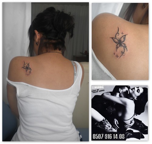 Butterfly tattoos design on upper back women