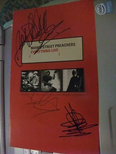 My signed Everything Live!