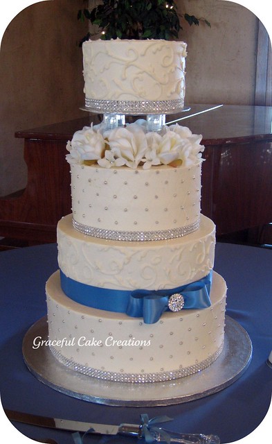 Elegant White and Cornflower Blue Wedding Cake with Silver Accents
