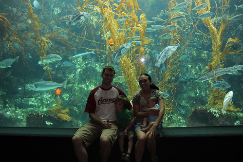 Family picture in front of the large aquarium