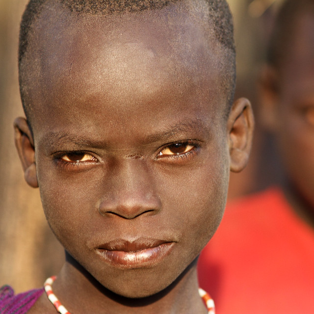 Ethiopia tribes Surma Suri people Young boy seen in a village near Koka