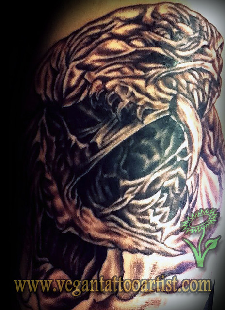 craken tattoo inside arm