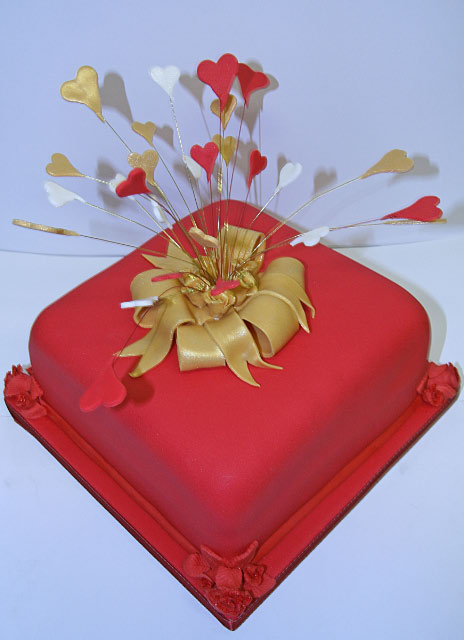 Red Gold and Cream Wedding Cake Vanilla madeira with strawberry conserve 
