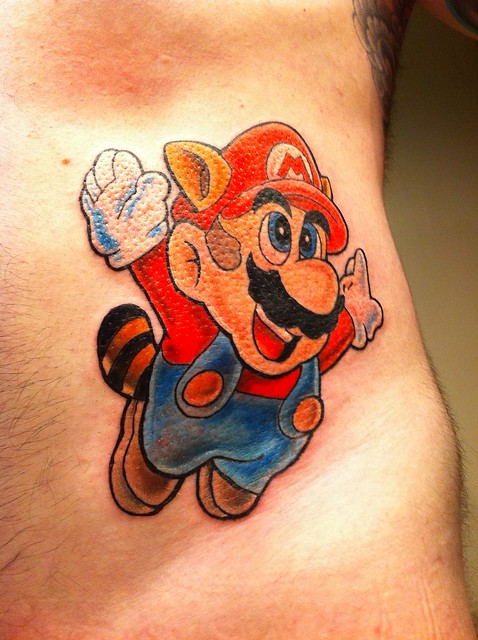 My newest tattoo flying Mario from Super Mario Bros 3
