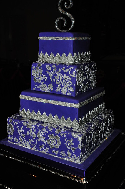 Royal purple fondant wedding cake with royal icing stencil fondant lace with